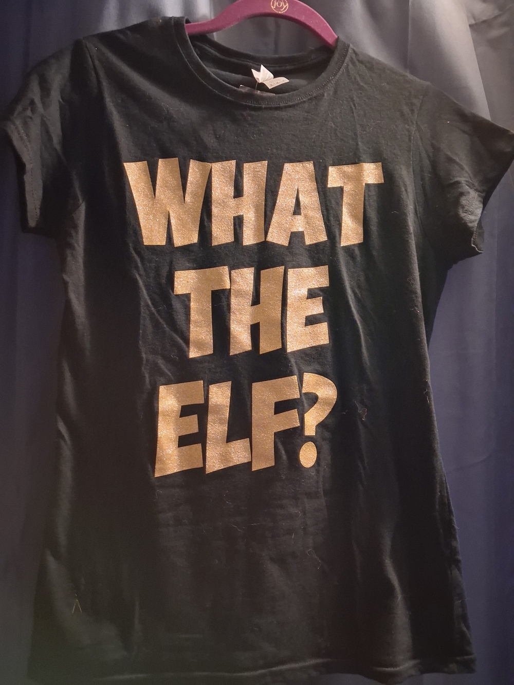 Rue21 Black Tee with Gold Glitter "WHAT THE ELF?" Graphic
